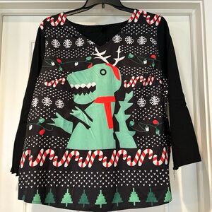 Dinosaur blouse-smaller 4x and front fabric is not stretchy at all-more silky.